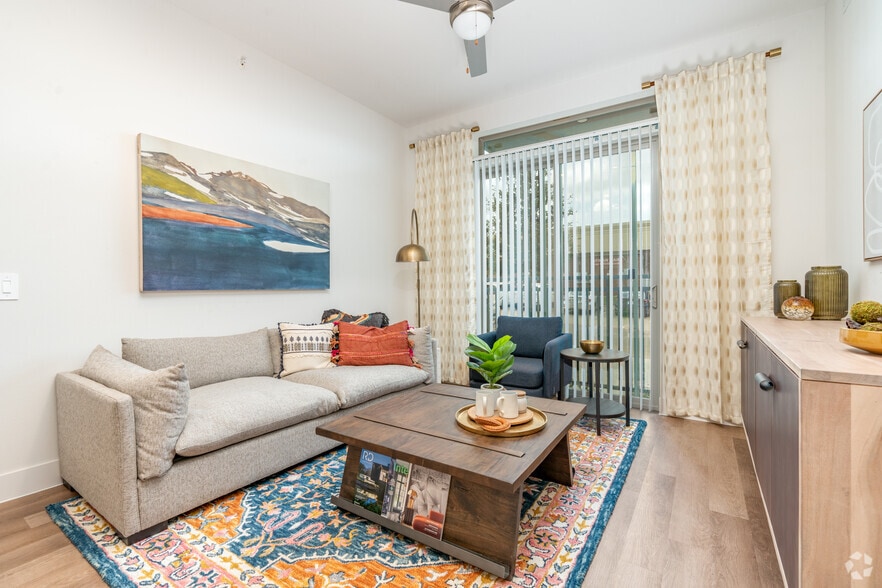 1BR, 1BA - 706SF - Living Room - The International at Valley Ranch