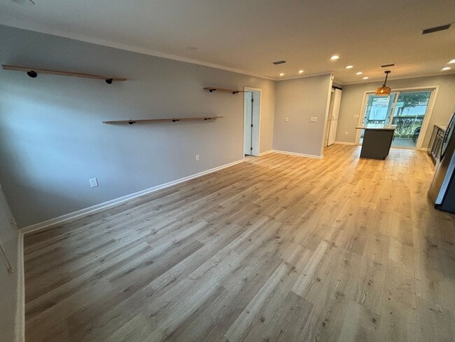 Building Photo - Renovated 3 Bed 2 Bath Home with Fenced in Yard. Screened in Porch. Tesla Charger. Minutes from J...