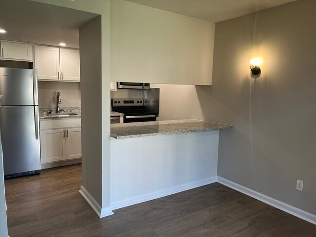 Dining Room to Kitchen - Rose Hill Apartments