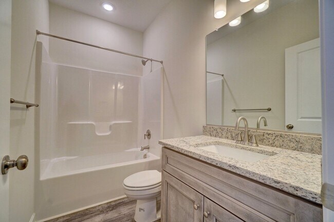 Building Photo - Available 08-05-25! Coastal Luxury Townhom...