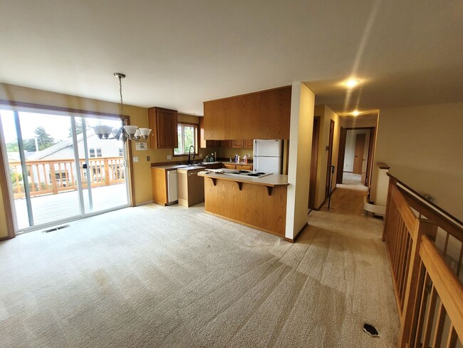 Building Photo - Charming Split-level 4 Bedroom Home - E Mc...