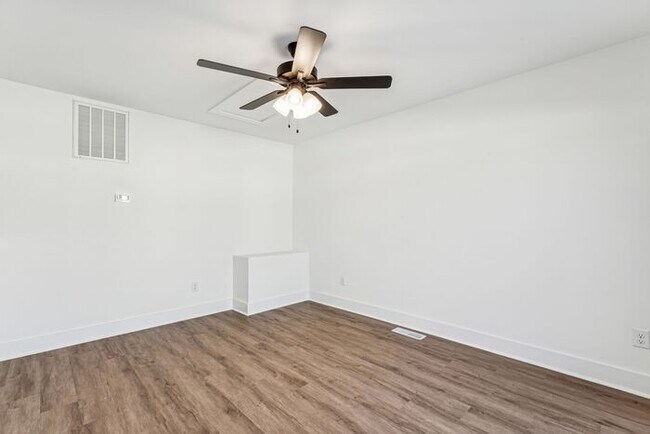 Building Photo - High-End 2BR Townhome | Rooftop Terrace + 2-Car Garage | 24-Unit Community