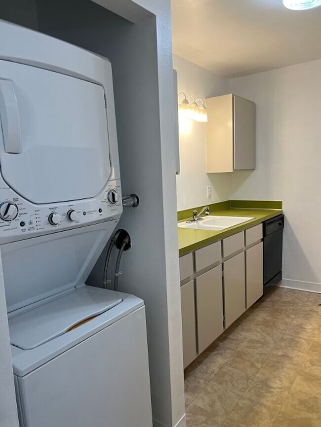 Building Photo - Well-Appointed Apartment Available This August