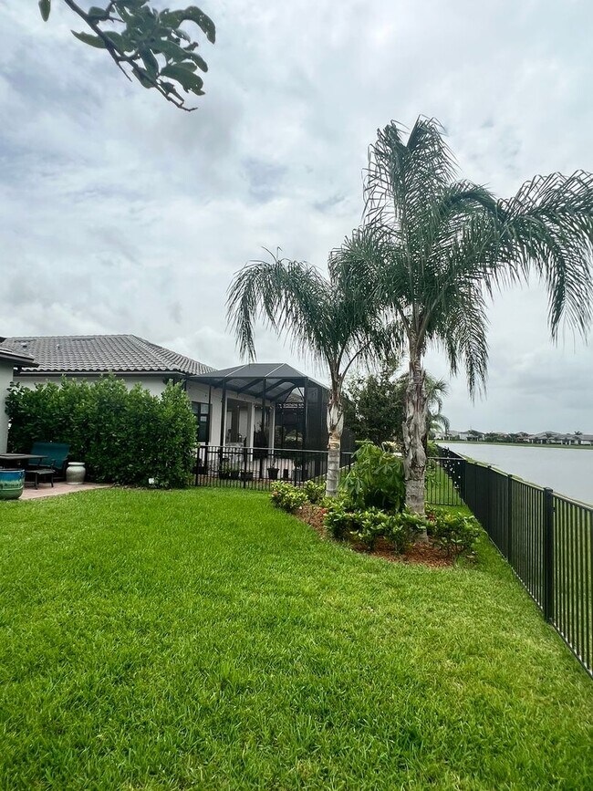 Building Photo - STUNNING LAKEFRONT 3 BEDROOM, 2.5 BATH HOM...