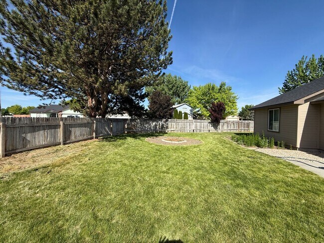 Building Photo - Updated 4-Bedroom Corner Lot Home with New Flooring, Carpet & Fresh Interior Paint