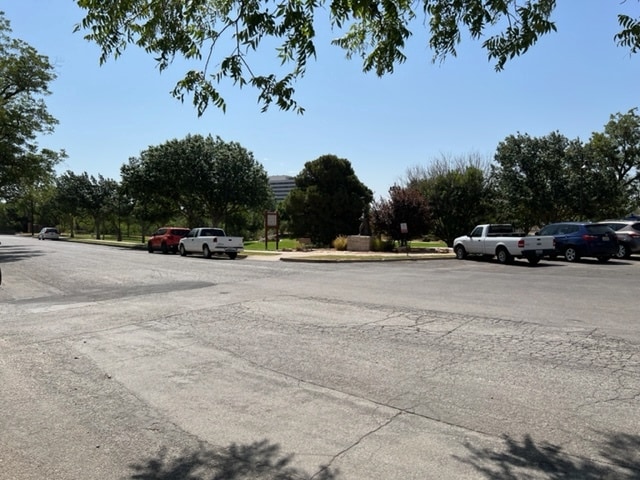 Park across the street - 208 E Twohig Ave