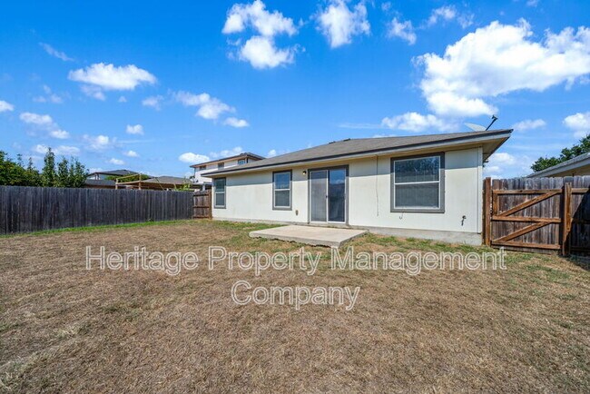 Building Photo - 4935 Dahlia Terrace