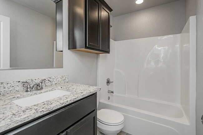 Building Photo - Live, love, and grow in this charming home!
