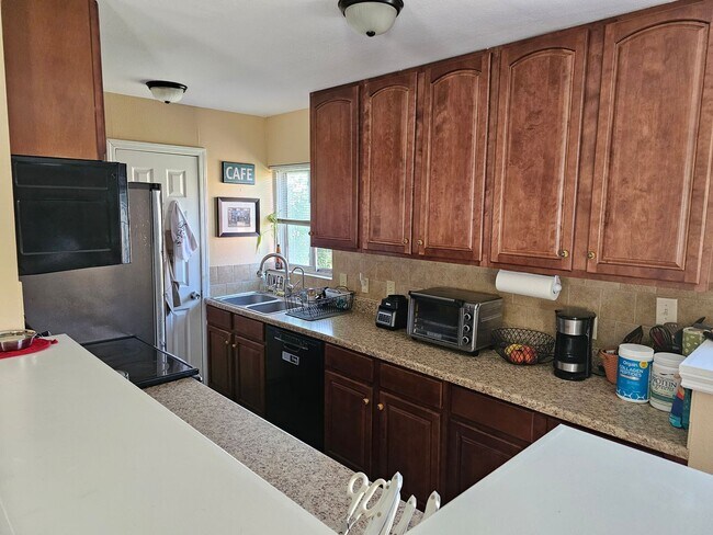 Building Photo - University Hills Charming Updated House 3 Bedrooms 1 Bath w/ Large Yard, Solar Panels & More
