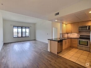 Building Photo - Top-Floor Sunset Facing 2 Bedroom Condo Fo...