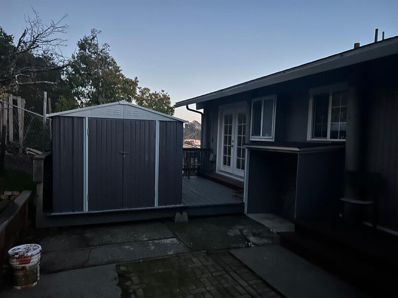 Back Yard with storage area - 55 Park Cir