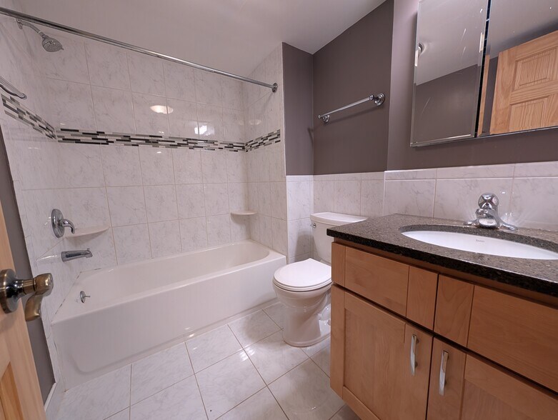 renovated bathroom - 4201 Roland Ave