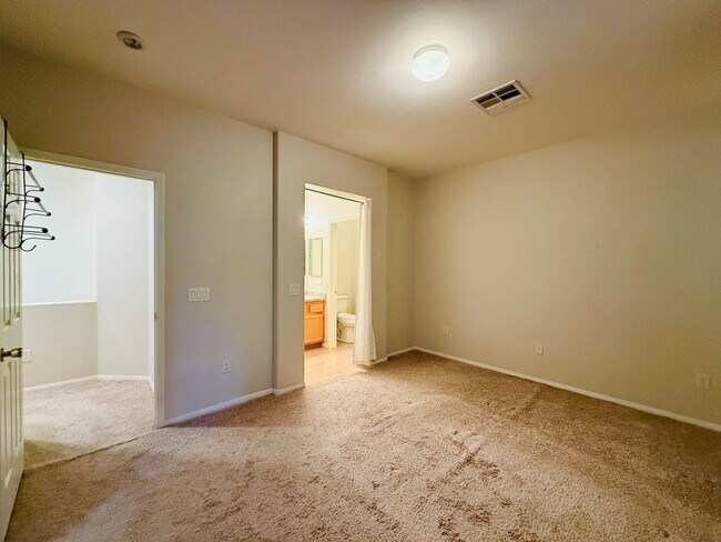 Building Photo - Immaculate and Inviting Two-Story Condo in Lone Mountain Available! 1/2 OFF THE FIRST FULL MONTH'...