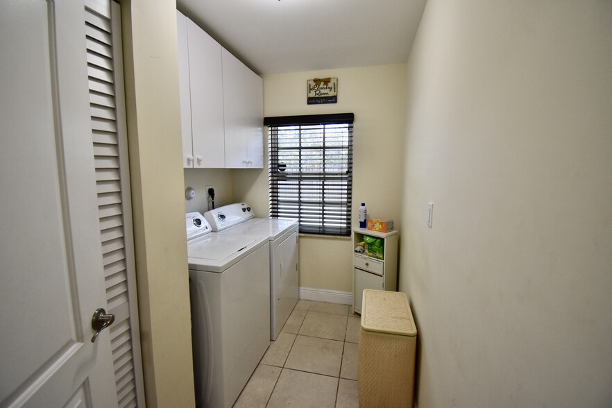 full size washer & dryer in laundry room - 1473 NE 48th St