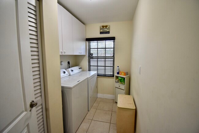 full size washer & dryer in laundry room - 1473 NE 48th St