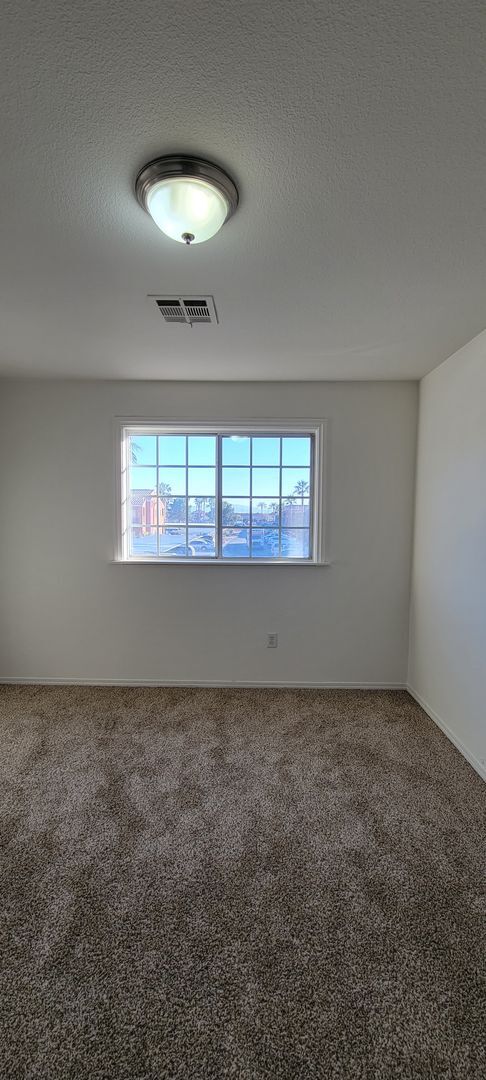 Building Photo - $500 OFF MOVE-IN! 2 Bedroom Condo near Air...