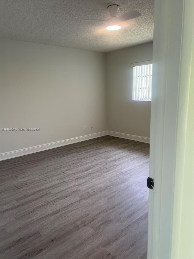 Building Photo - 6091 NW 61st Ave