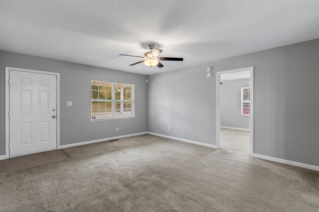 Building Photo - SW - Like New Home! Newer SS Appliances & Cabinets, Ceiling Fans, Blinds, Front Porch and Deck. M...