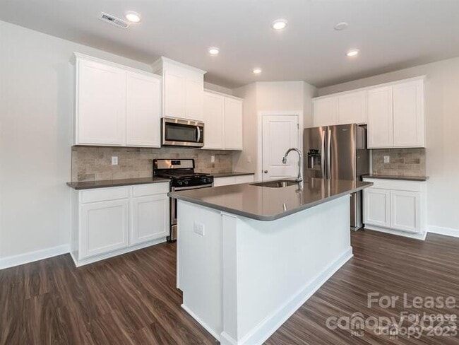Building Photo - Charming 3-Bedroom Home with Landscaped Ba...
