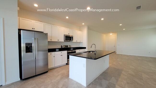 Building Photo - NORTH RIVER RANCH CORNER TOWNHOME! AVAILABE IN MARCH 2026 -LONG TERM LEASE!