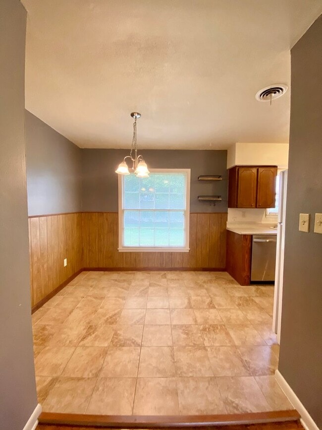 Building Photo - Available June 29: 4 Bedroom Unit in Estab...