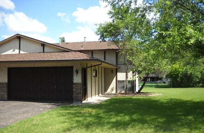 Front view of this 3 bdrm Duplex - 7948 Ewing Ave N