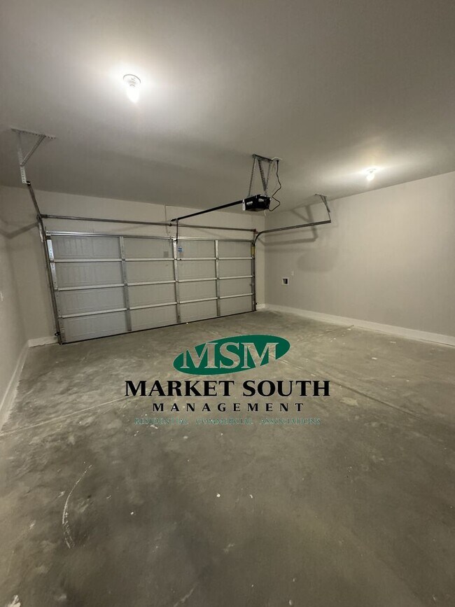 Building Photo - NEW CONSTRUCTION WITH PRIVACY FENCED YARD