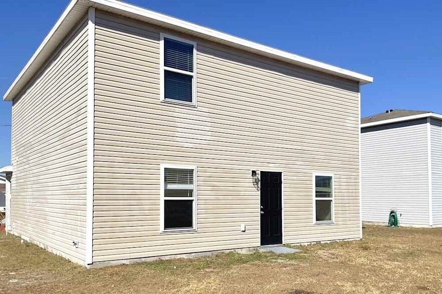 Building Photo - 202 Gladiola Ct