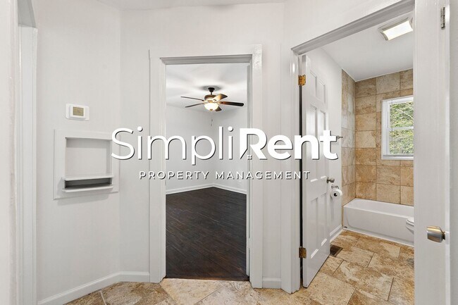 Building Photo - PRICE REDUCED! 1st month's Rent FREE with a 13-month lease!