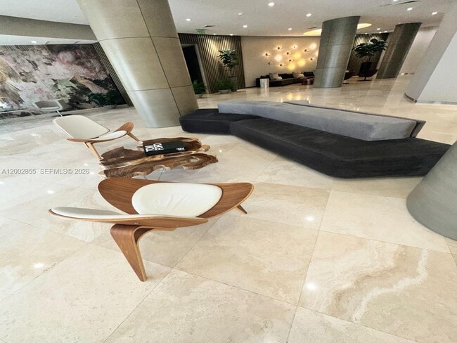 Building Photo - 10275 Collins Ave