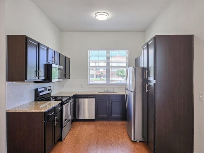 Building Photo - 2400 Louis Henna Blvd