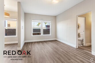 Building Photo - ~1 Month FREE~ Gorgeous, Sunlit Studio Fea...
