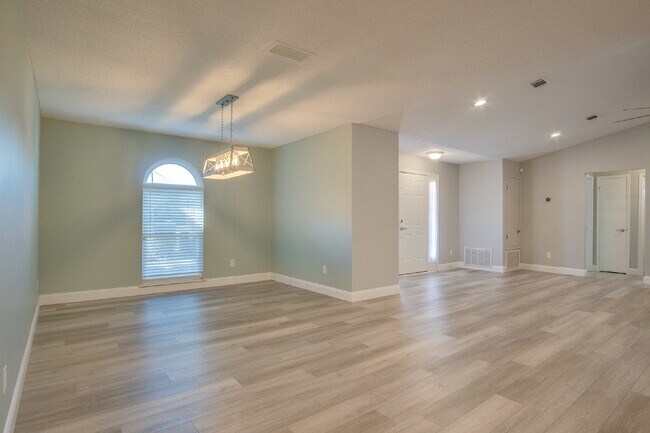 Building Photo - Lakefront 3BR/2BA Home on Orion Lake with Florida Room, Screened Patio, Hot Tub (As-Is), Solar Pa...