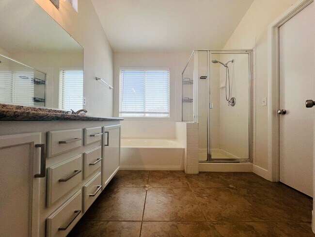 Building Photo - REMODELED, SPACIOUS, 4 BEDROOM HOME WITH VAULTED CEILINGS AND LOFT