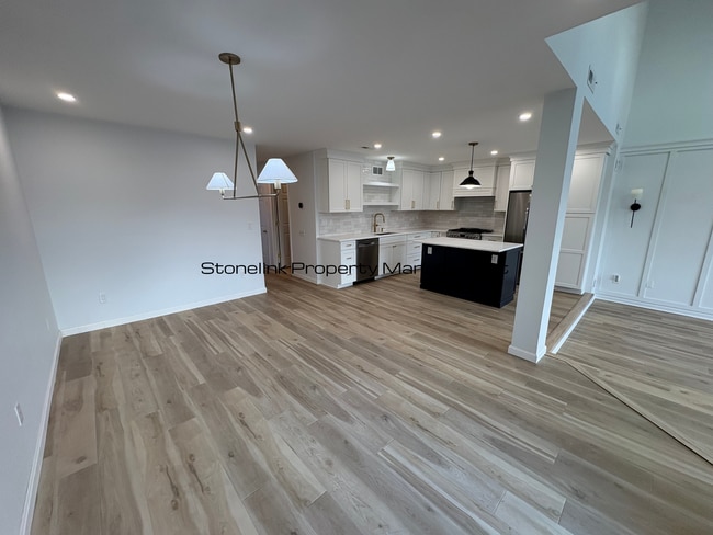 Building Photo - Fully Redesigned Townhouse Style Condo For Rent in Desirable Louisquisset Community!