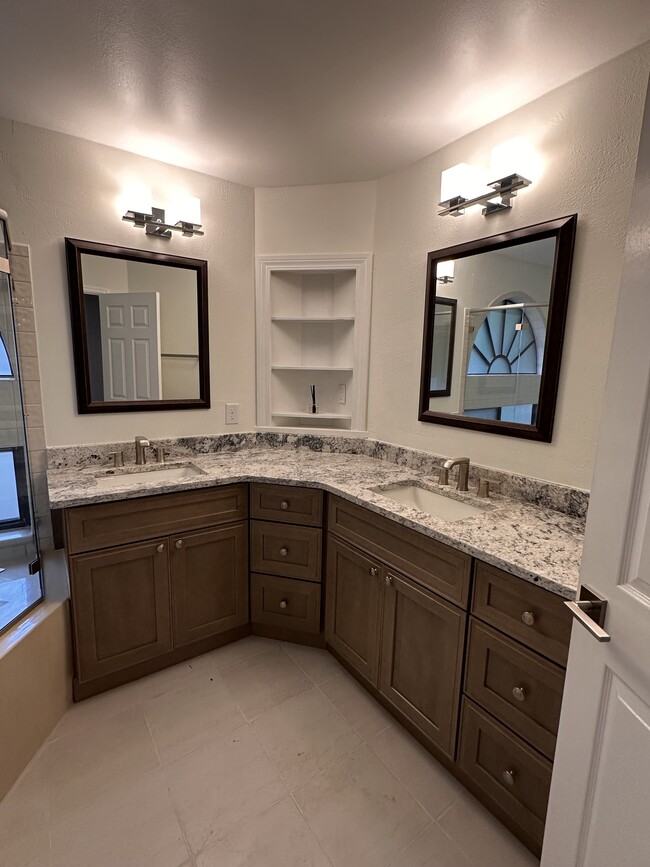 Partially updated bathroom with Double vanity - 2912 Lake Pineloch Blvd