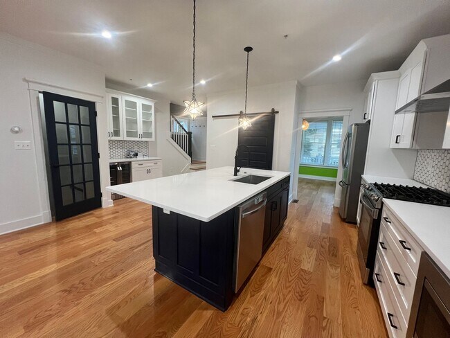 Building Photo - Stunning 4 BR/3.5 BA Single-Family Home in...