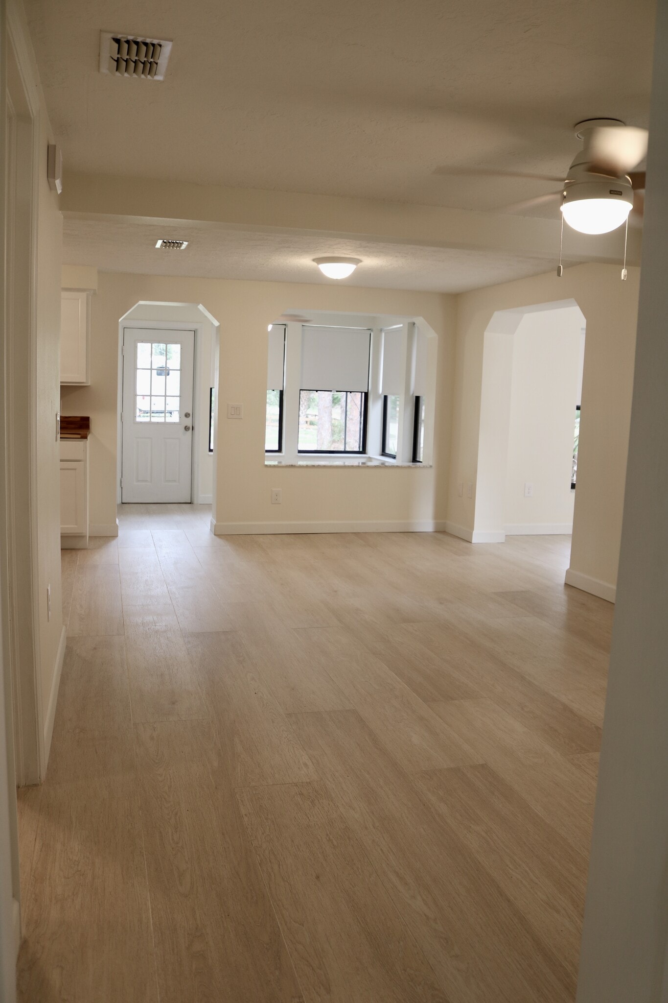 Beautiful wood plank tile floors throughout. - 33 63rd St
