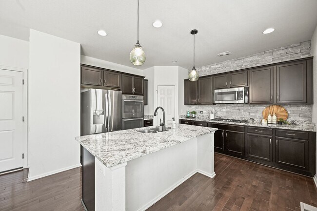 Building Photo - Beautiful 5 Bedroom Home- Move in Ready- C...