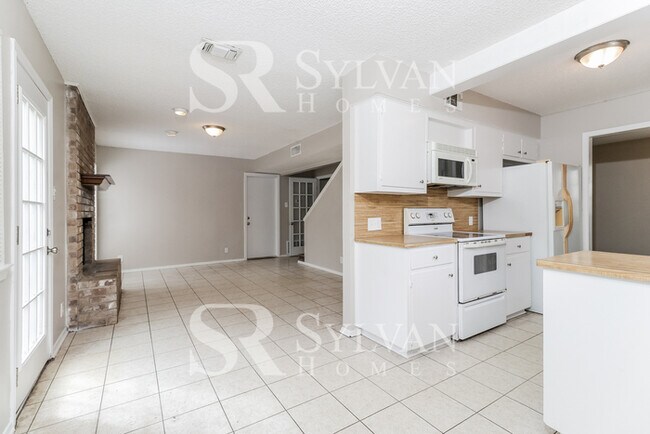 Building Photo - Turn the key. Enter. Smile. Repeat every day!