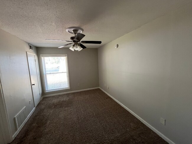 Building Photo - Spacious 4BR/2BA Memphis Home | 1,913 Sq Ft, Hardwood Floors, Brick Fireplace & Fenced Yard