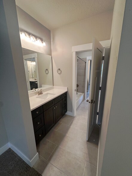 upstairs bedroom 2 vanity - 1088 S High Ridge Rd