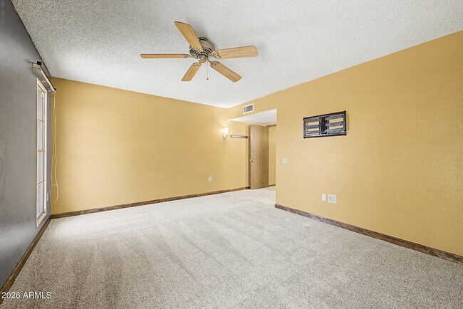 Building Photo - 9847 W Wrangler Dr