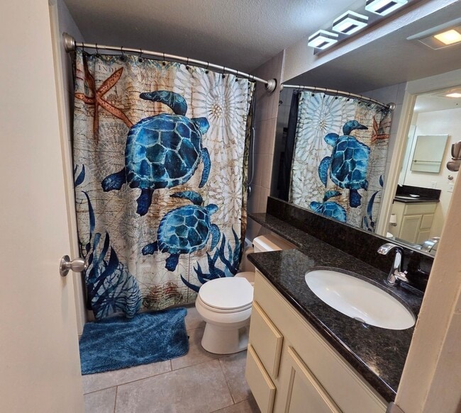 Building Photo - Pet Friendly downstairs 2/1.5-bedroom North Kihei Condo