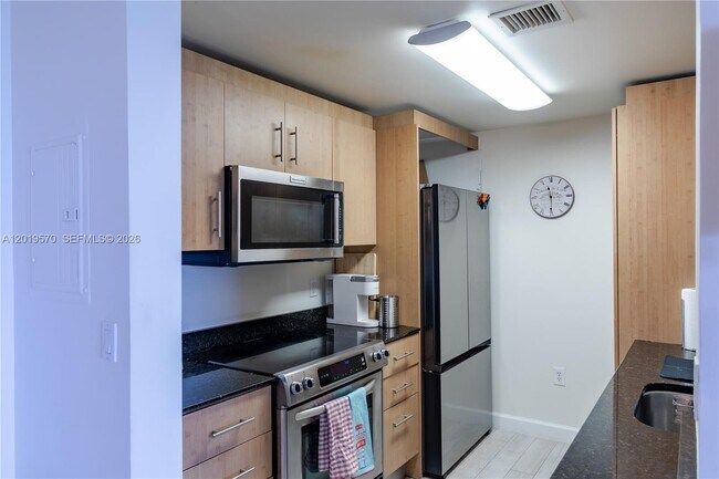 Building Photo - 10275 Collins Ave