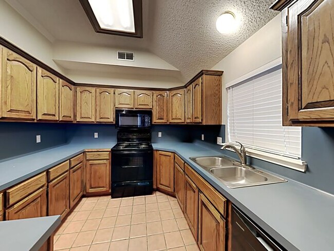 Building Photo - Move in before May 1st and get $1,000 OFF ...