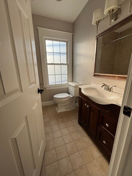 Full bath on main level - 242 Bedford Rd