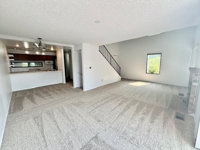 Building Photo - DES MOINES CONDO WITH PEEK-A-BOO SOUND VIEWS & PRIVATE GARAGE!