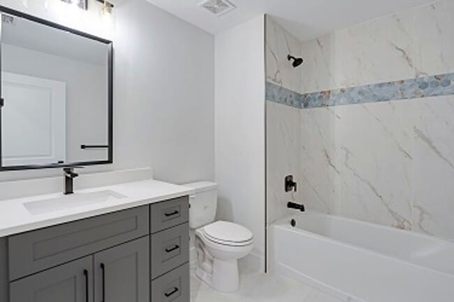 Building Photo - 2023 Duplex All tiled - 3 Bedroom Plus Den/2 Bath & 2 car Garage