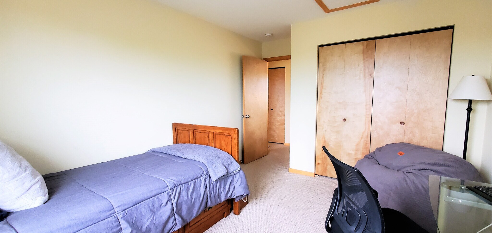 Bedroom 1/upper level. (photo from neighboring unit with the same layout) - 1756 St Joseph St